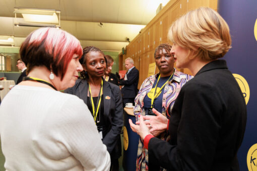 A group of kinship carer campaigners talking to Helen Hayes MP